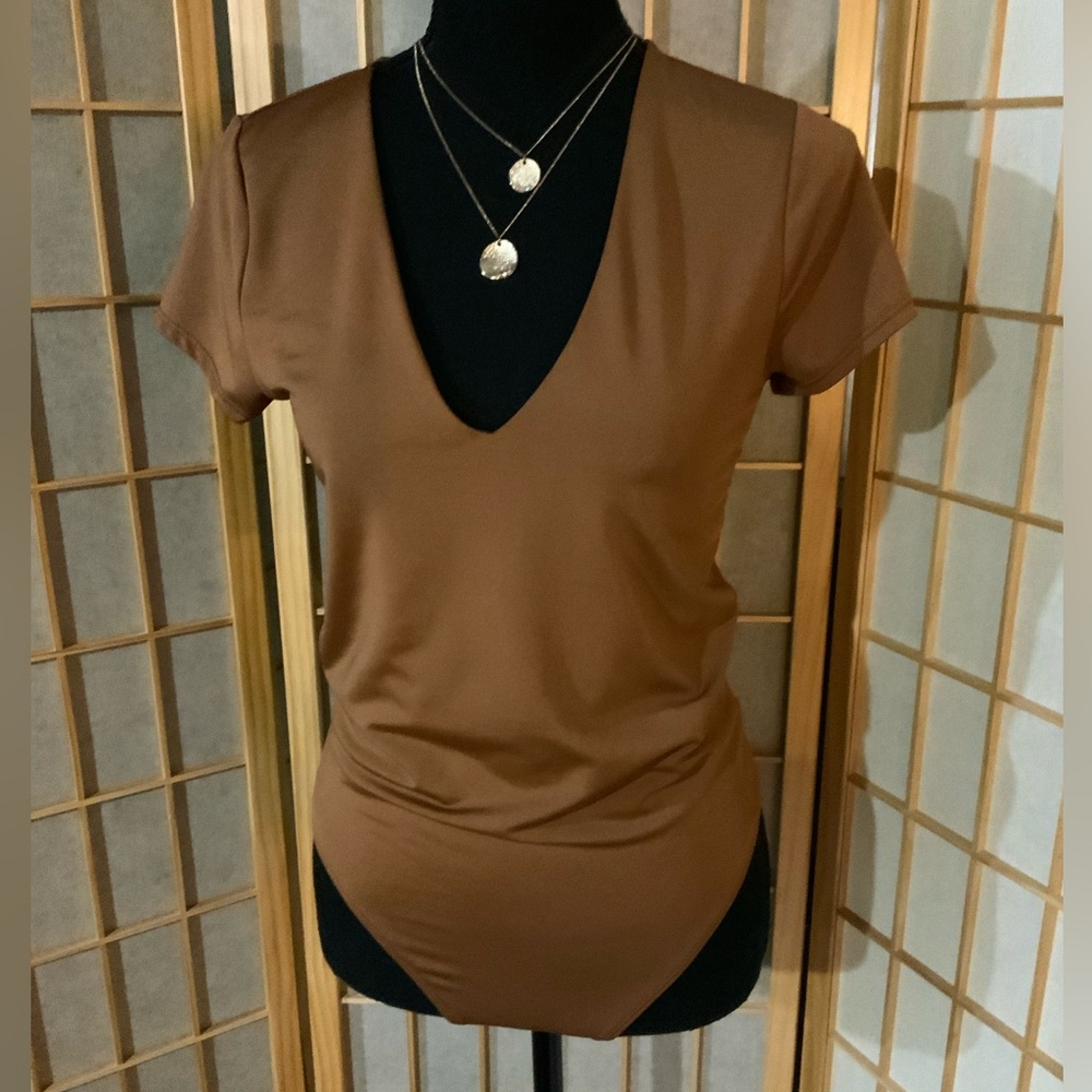 NWOT Brown V-Neck Women's body contour bodysuit.
